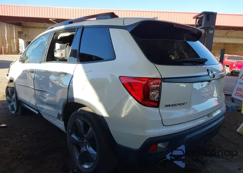 2019 Honda Passport Touring z USA, uszkodzony, nr VIN 5FNYF8H93KB015485